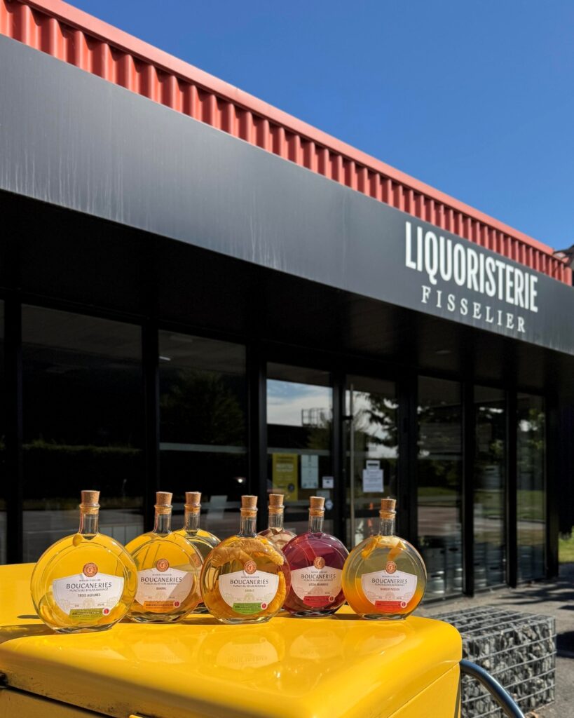 Bouteilles et devanture de la Maison Fisselier